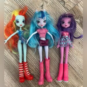 Three My Little Pony Equestria Girls dolls from the Rainbow Rocks series